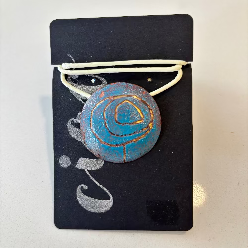blue swirl rust necklace