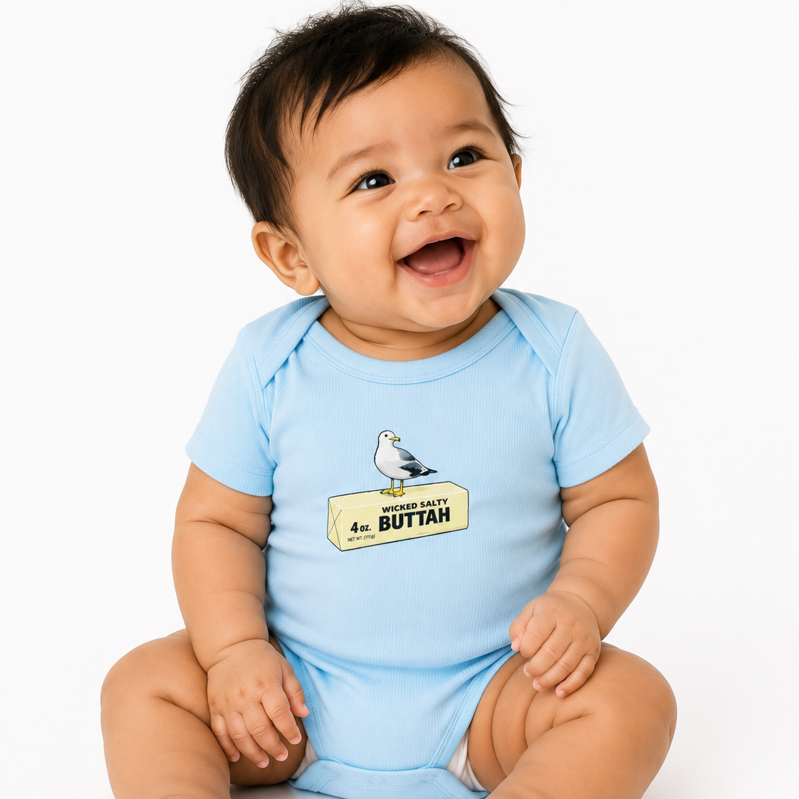 Baby wearing a light blue onesie with a graphic and text, sitting on a white background