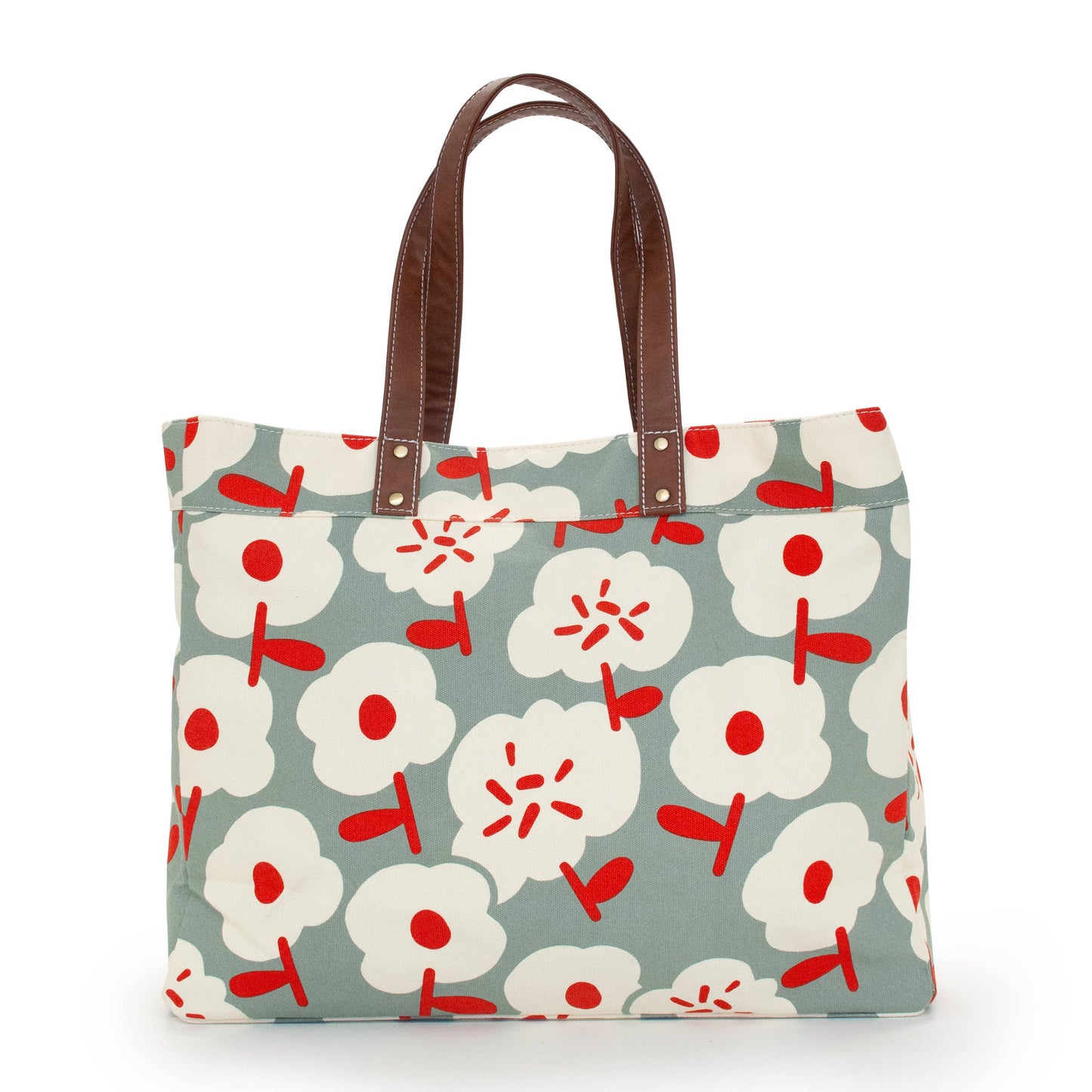 Floral patterned tote bag with brown handles on a white background