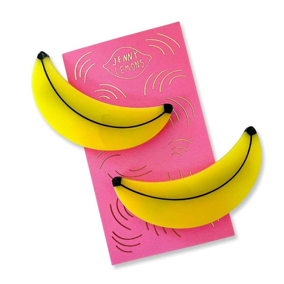 Two yellow bananas on a pink card with 'Jenny Lemons' branding on a white background