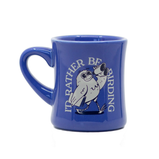 Blue mug with a bird design and text on a white background
