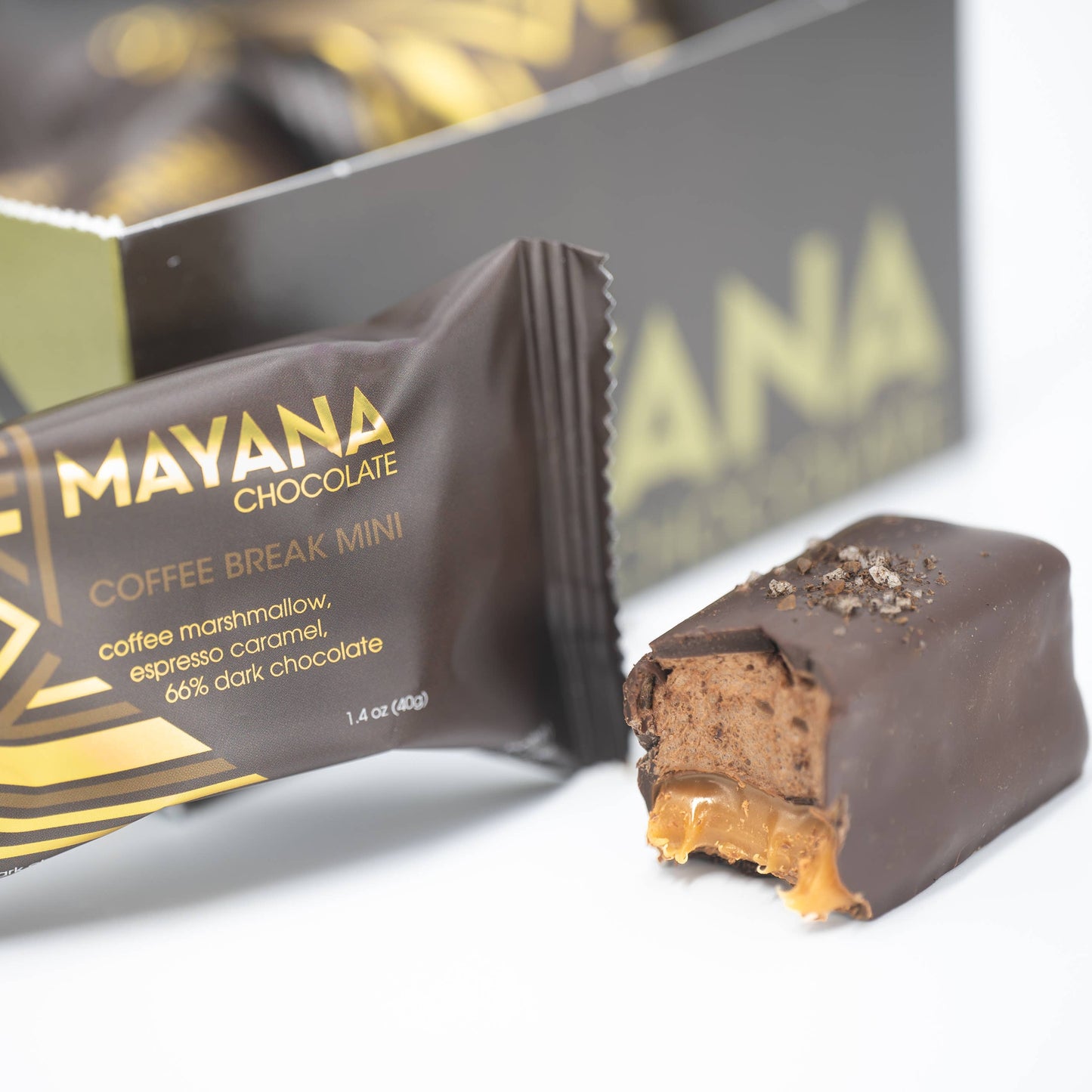 Mayana chocolate bar with packaging on a white background