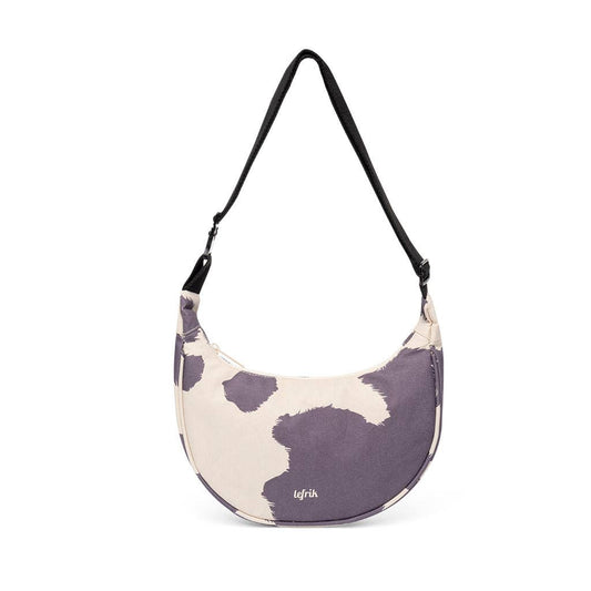 Purple and beige patterned bag with a black strap on a white background