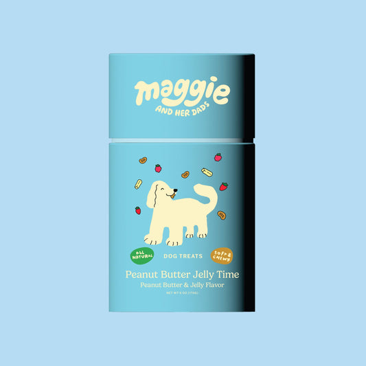 Dog treats packaging with 'maggie and her dogs' branding on a light blue background