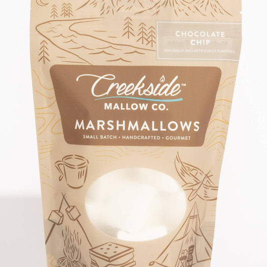 Packaging of Creekside Mallow Co. marshmallows with illustrations and text on a beige background