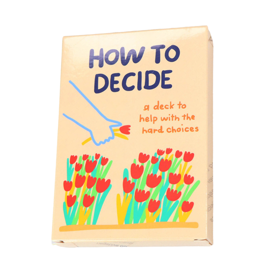 Card game box titled 'How to Decide' with floral design on a beige background