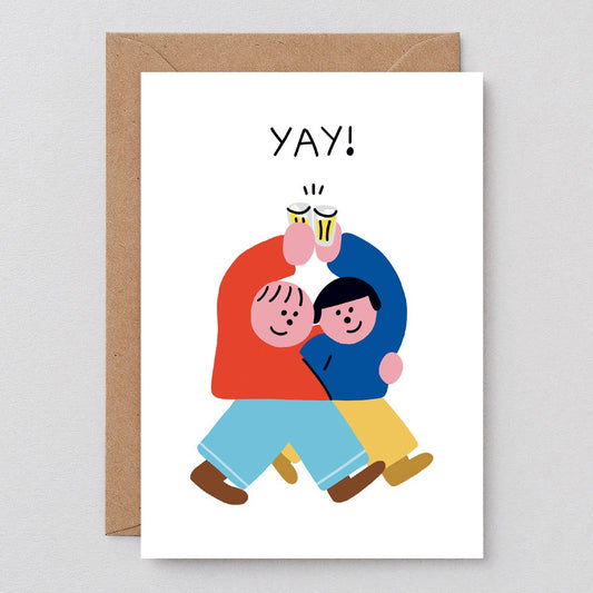 Greeting card with two people hugging and 'YAY!' text, on a white background with a brown envelope.