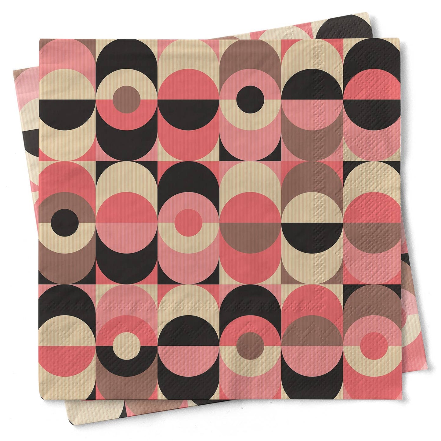 Set of two patterned napkins with geometric circle design on a white background