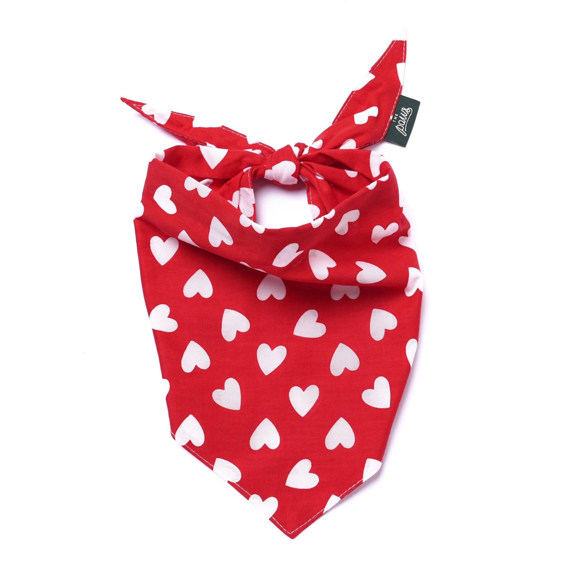 Red bandana with white heart patterns on a white background