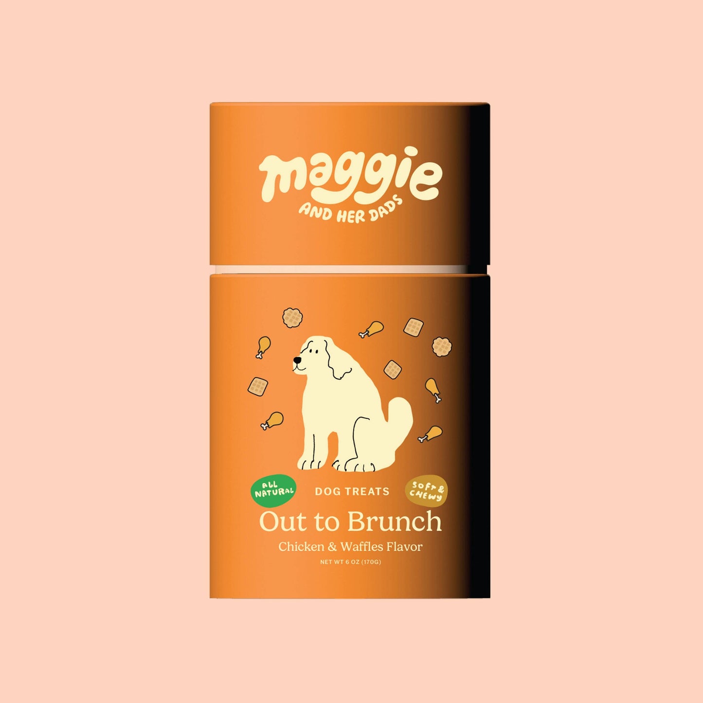 Dog treat packaging with 'maggie and her dads' branding on a peach background