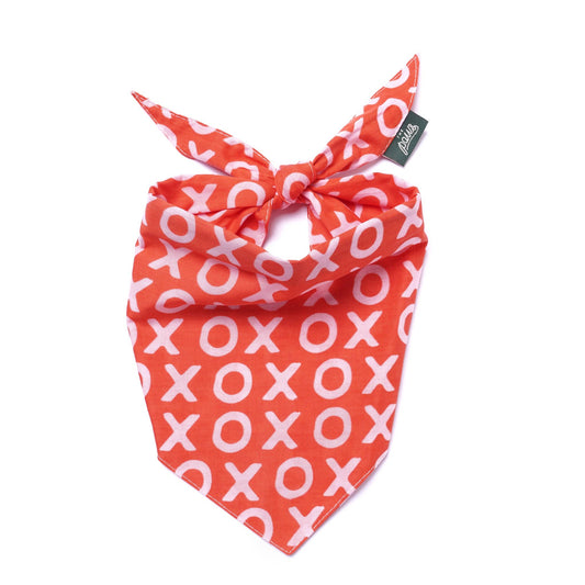 Red bandana with white 'XOXO' pattern on a white background