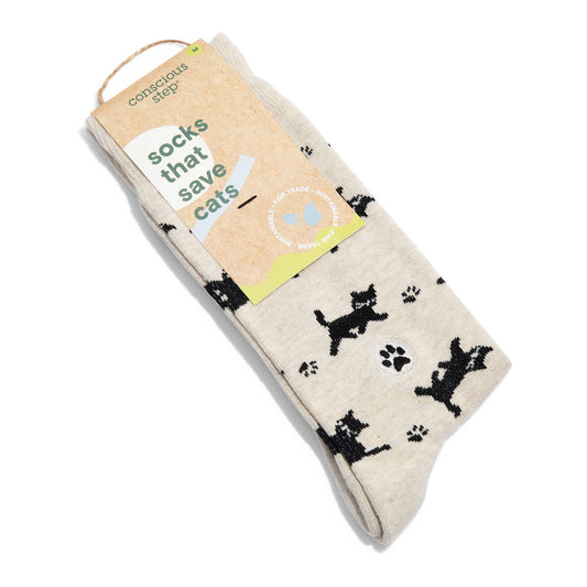 Beige sock with black cat designs and 'Conscious Step' packaging on a white background