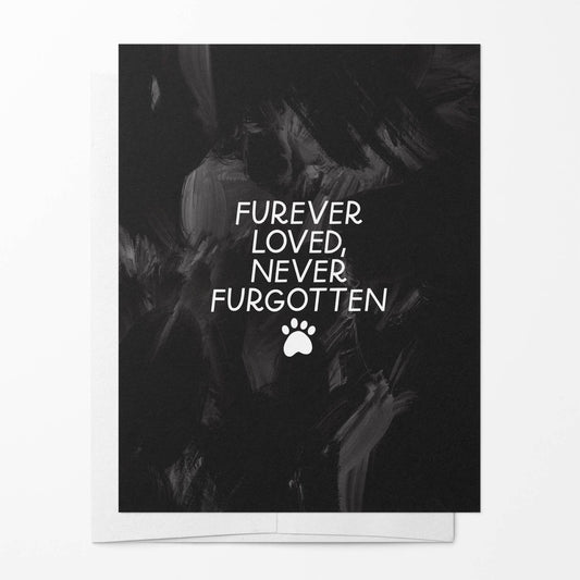 Greeting card with paw print and text 'Furever Loved, Never Forgotten' on a black background.