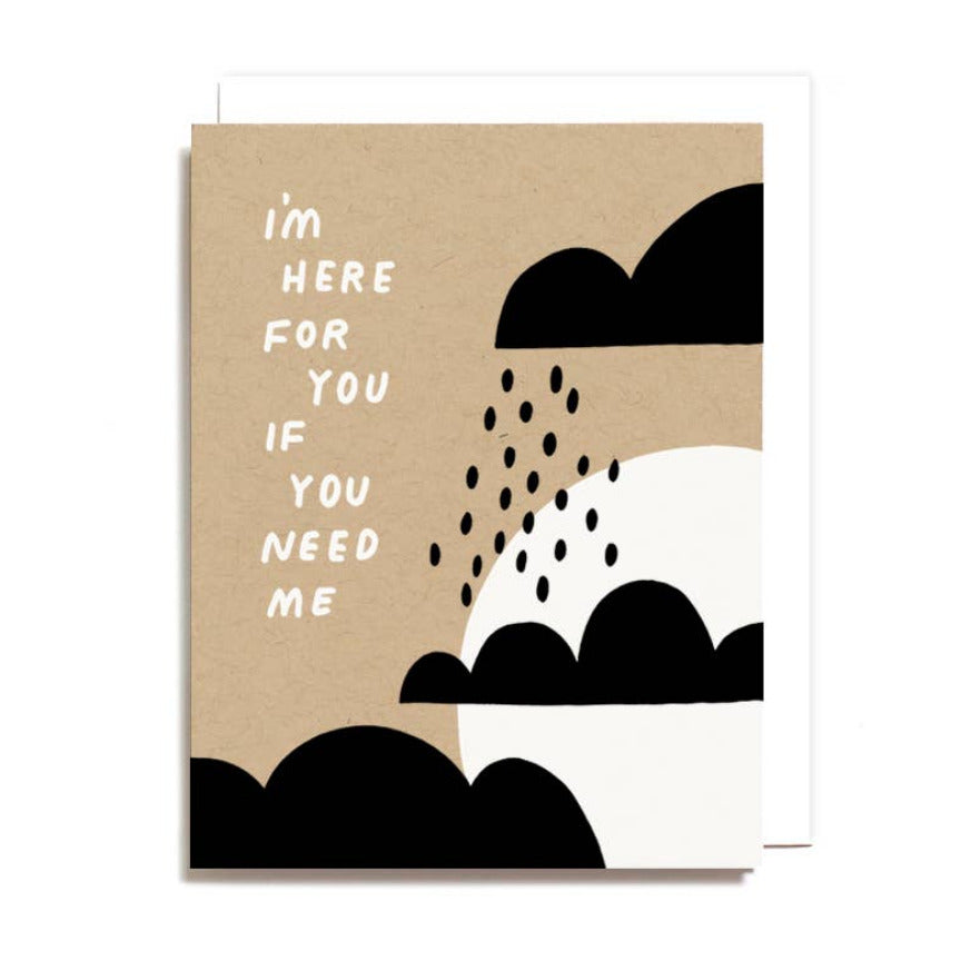 Kraft paper card with black cloud illustrations and text on a white background