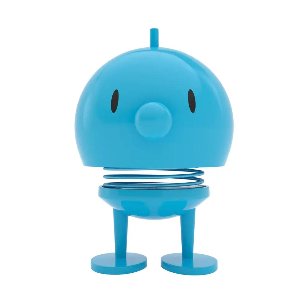 Blue spring toy on a white background