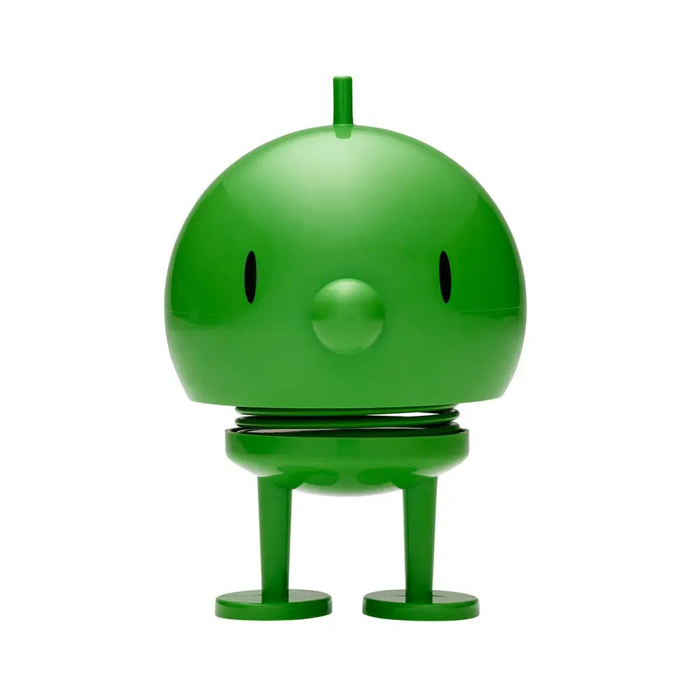 Green robot toy on a white background