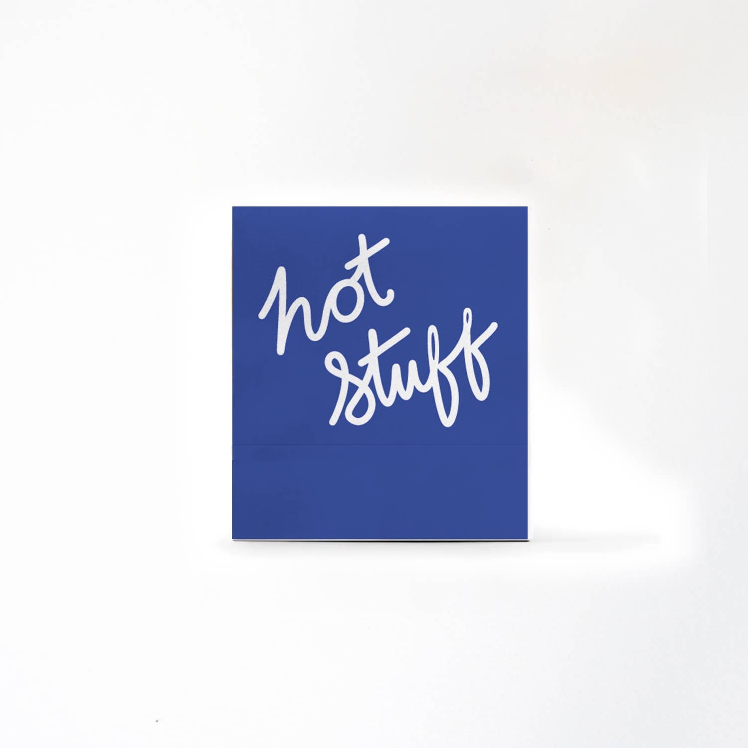 Blue square with white text 'hot stuff' on a white background