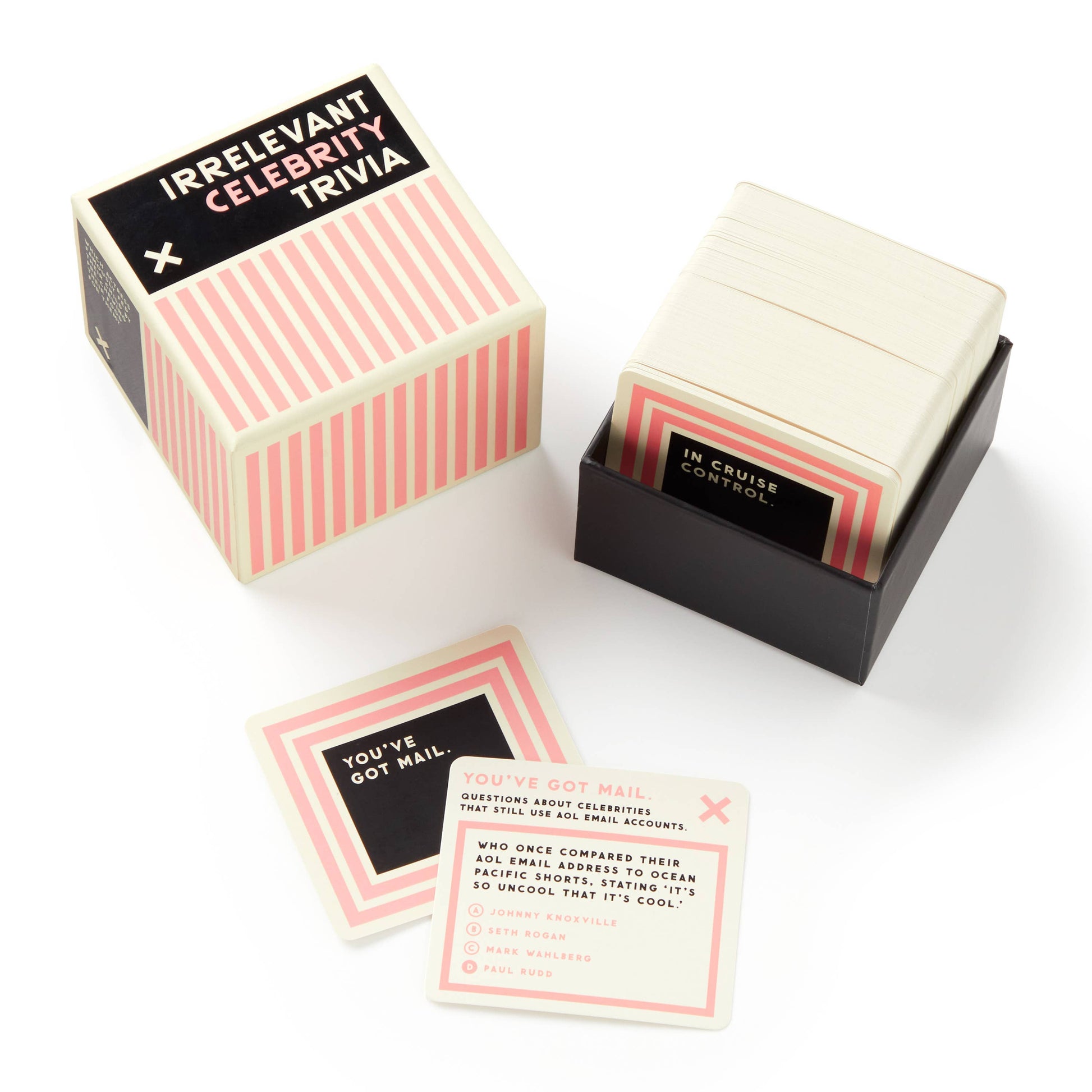 Irrelevant Celebrity Trivia game boxes with cards on a white background