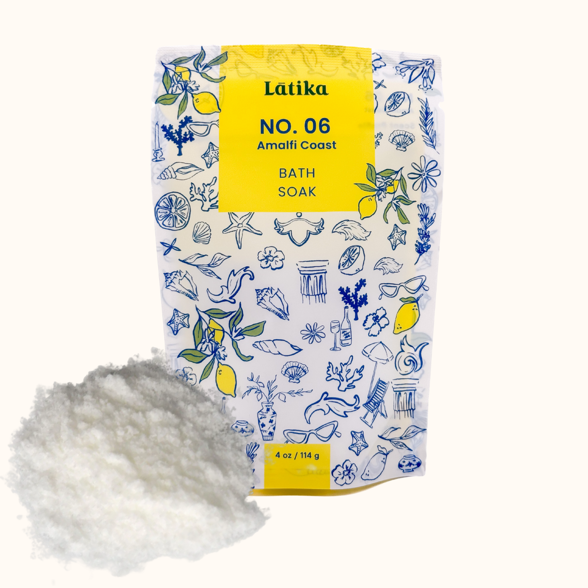 Bath soak packaging with decorative design and visible contents on a white background