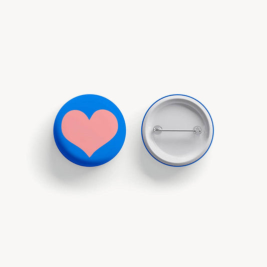 Two buttons with a heart design on a white background