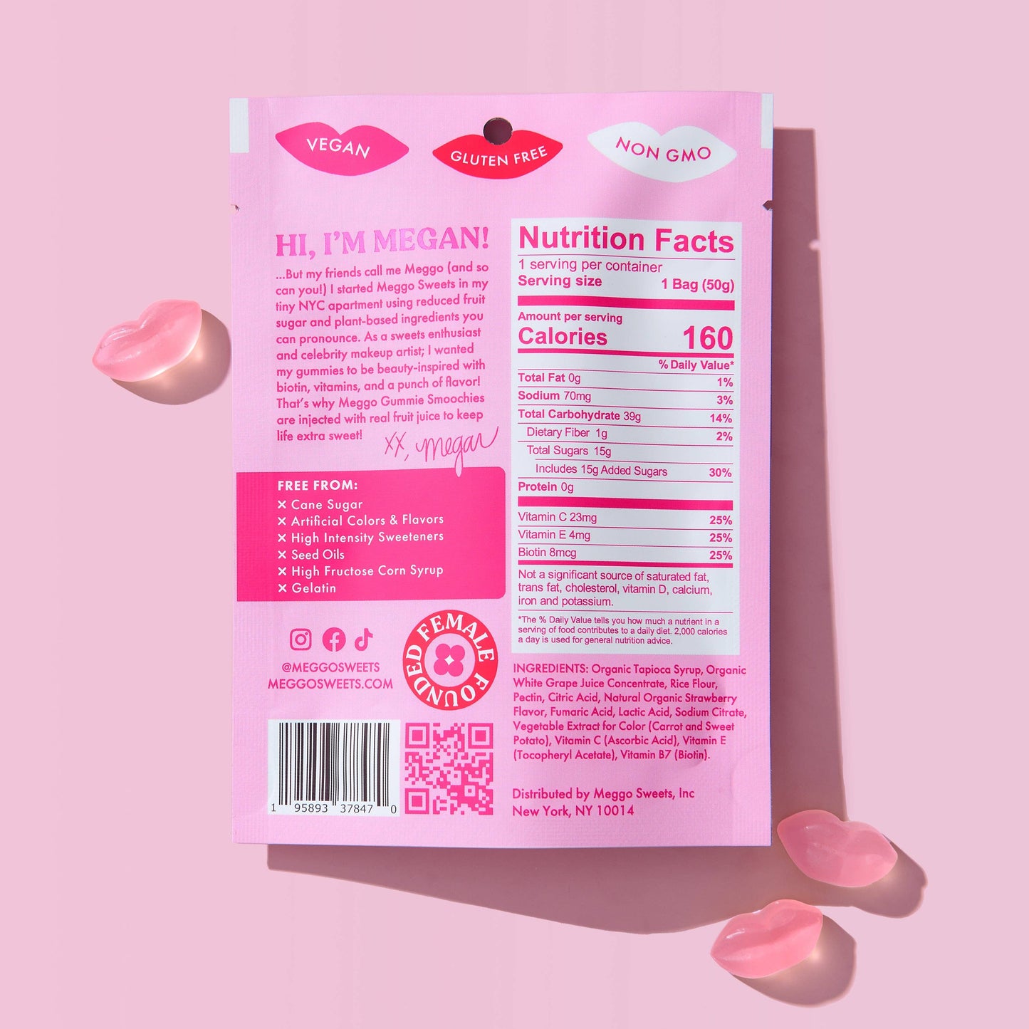 Pink package of Meggo sweets with nutrition facts and ingredients on a pink background