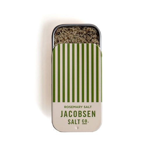 Tin of rosemary salt with striped design and 'Jacobsen Salt Co.' branding on a white background.