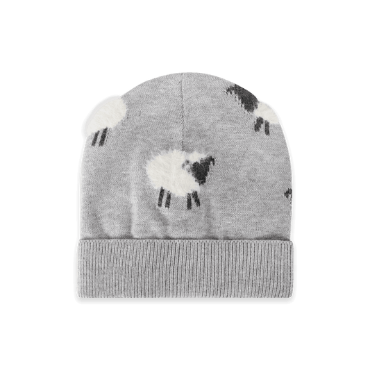 A light gray knit beanie hat featuring a pattern of stylized sheep in white and black, with a ribbed cuff, shown against a plain white background.