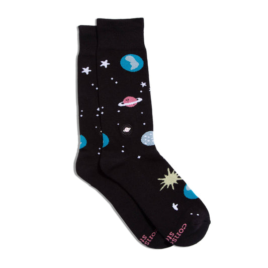 Black socks with space-themed designs on a white background