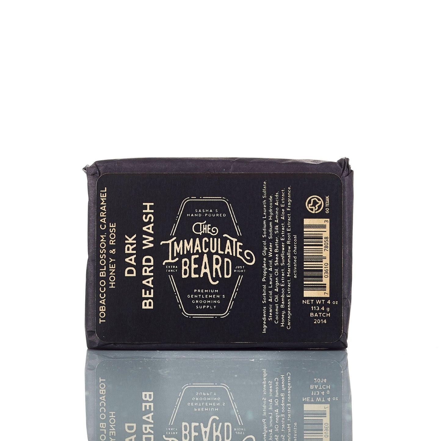 Bar of soap with 'The Immaculate Beard' in dark branding on a white background