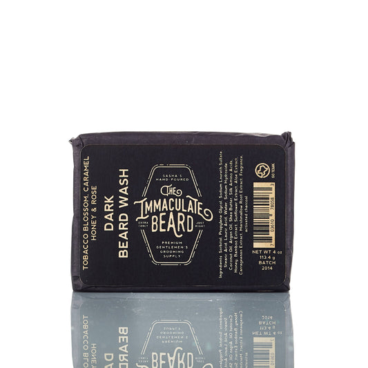 Bar of soap with 'The Immaculate Beard' in dark branding on a white background