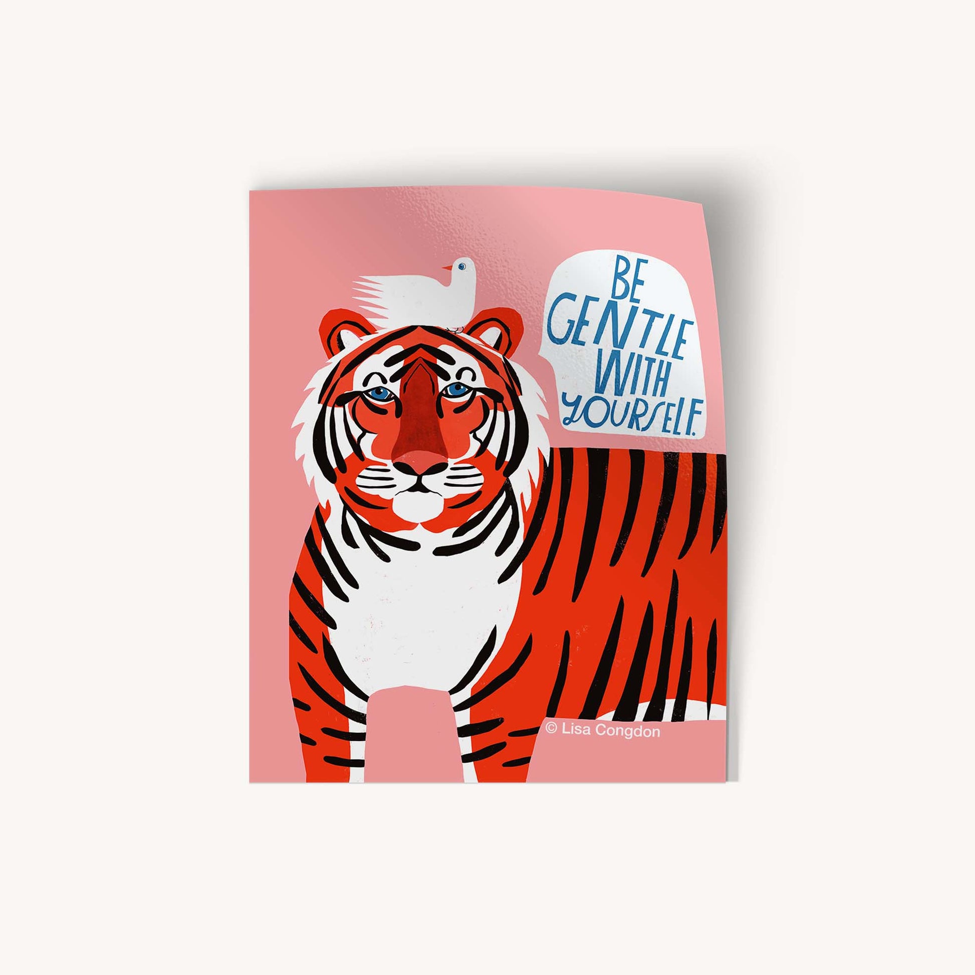 Notebook with a tiger illustration and text on a pink background