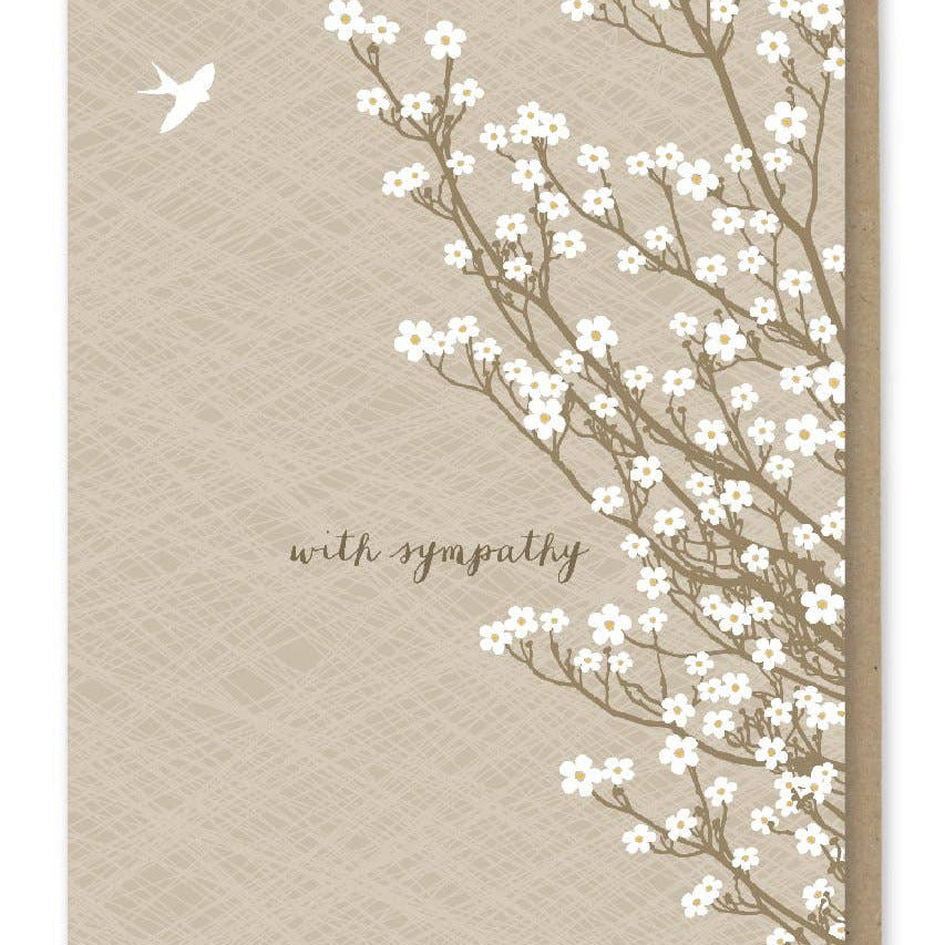 Greeting card with floral design and 'with sympathy' text on a textured beige background